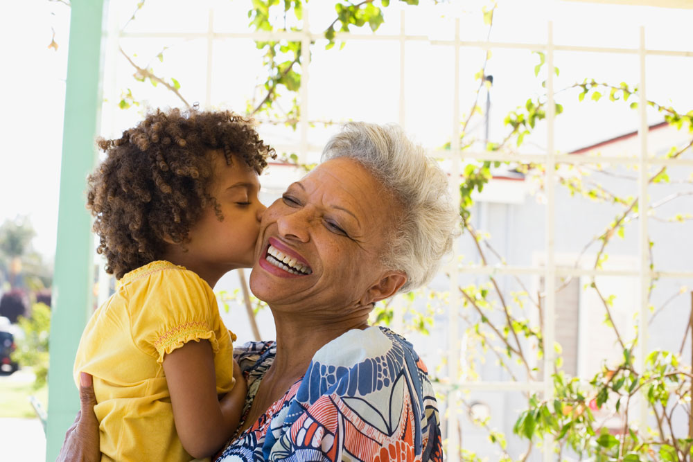 Assisted Living lifestyle at Charter Senior Living of Newport News - Grandmother with her granddaughter